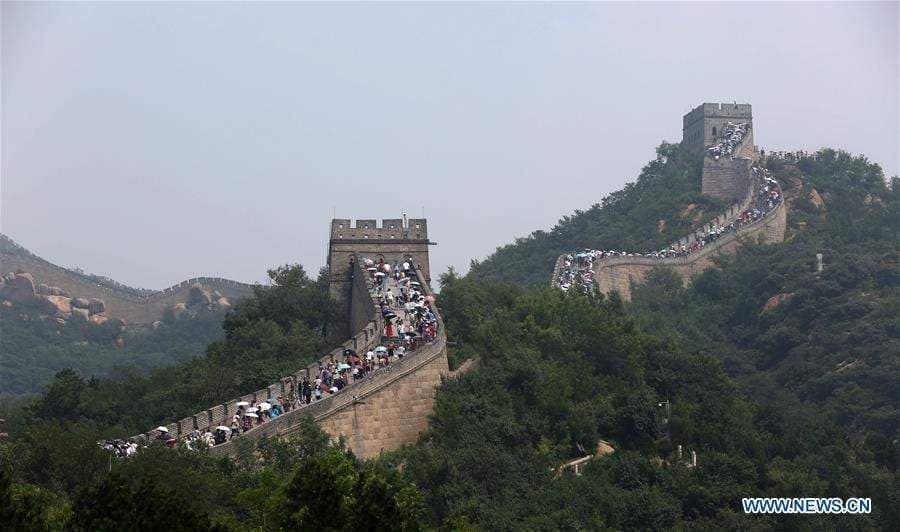 Tourists climb the Badaling section of the Great Wall